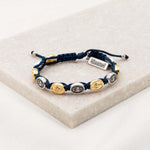 Navy Blue Miraculous Mary Bracelet with alternating gold and silver Miraculous Medals