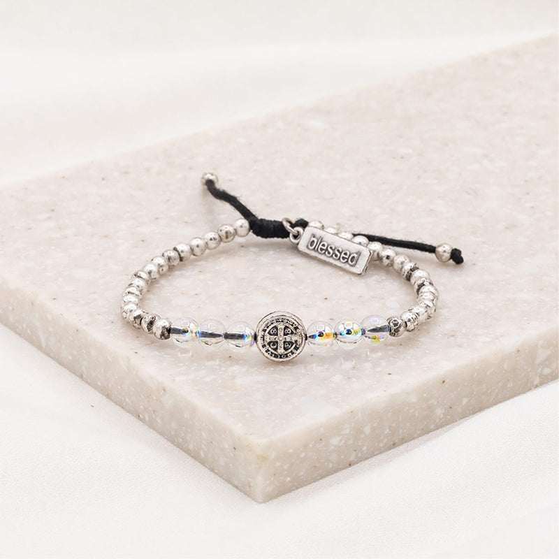 6 European crystals, silver or gold-tone beads with a silver or gold-tone Benedictine medal in the center and our signature "blessed" charm