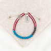 Protect and Serve Red White and Blue woven bracelet with blessed charm tag turquoise and hematite beads and a silver st. benedict medal of protection