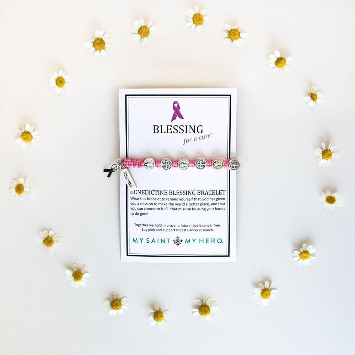 Pink Blessing for a Cure bracelet on a card encircled by daisies - mysaintmyhero.com