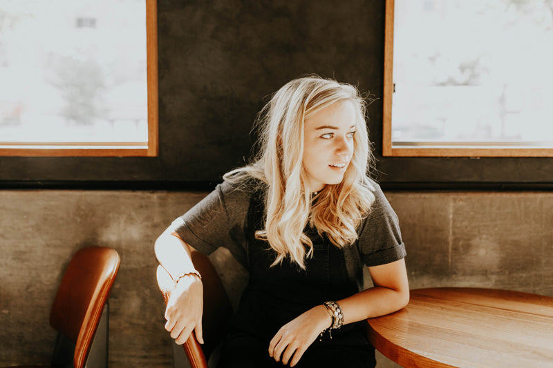 Sarah Erickson seated at a table