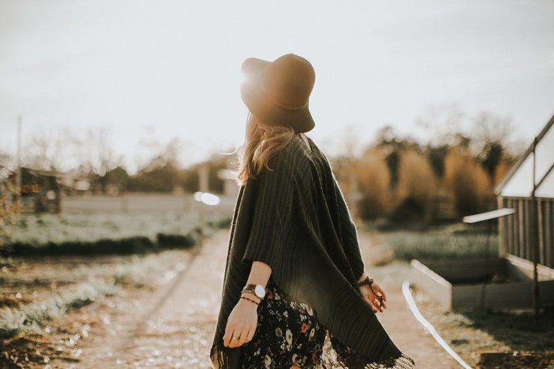 Madi Myers looks across a field, Cook/Photographer, Storyteller, Missionary