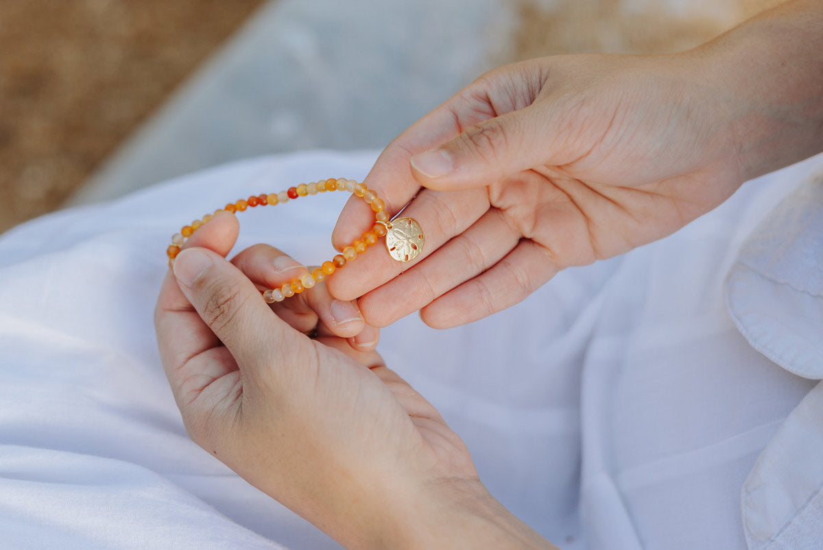 The Story Behind the My Saint My Hero Blessings of the Sea Sand Dollar Bracelet