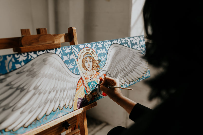 Artist Vivian painting Archangel Michael