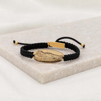 Wing of Protection black woven cording bracelet with gold angel wing medal