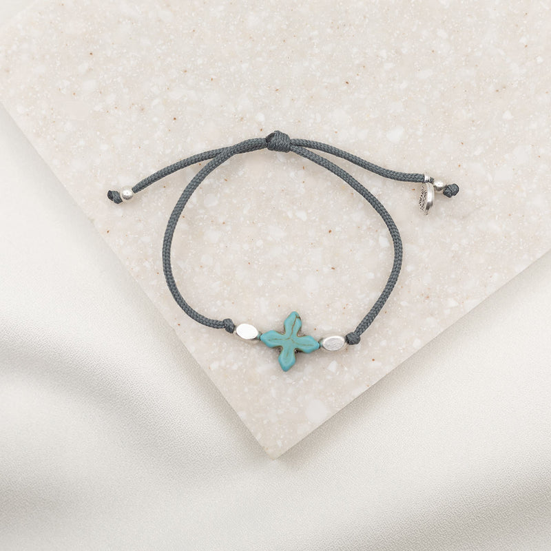 Simply Faith Corded Bracelet with dyed howlite cross two metal beads and a slipknot closure
