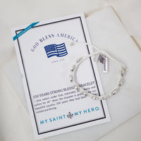 Silver bracelet on a card with 'My Saint My Hero' branding