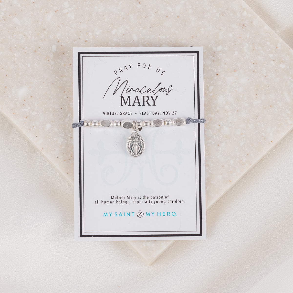 Miraculous Mary Little Saints Bracelet on card