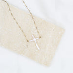 Abide Pearl Cross Necklace - Natural pearl cross on a gold link chain