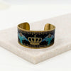 Crown of Glory Cuff black gold and blue sacred icon design gold tone cuff bracelet