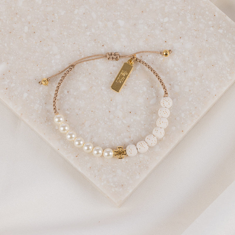 Heirloom crystal pearls and white lava beads with gold cross and faith charm on tan woven cording