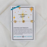 Christmas light bracelet packaging with card on a white background