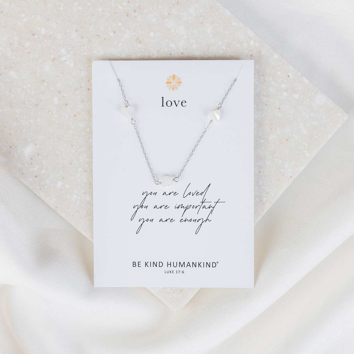 Silver Chain with Mother of Pearl Petite Hearts Necklace on an inspirational product card