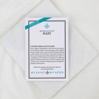 Card with information about Miraculous Mary medals on a white background