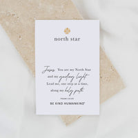 White card with text and 'north star' branding on a beige surface