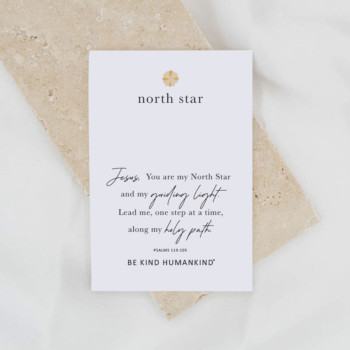 White card with text and 'north star' branding on a beige surface