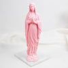 Pink Our Lady of Lourdes statue of a religious figure on a white background