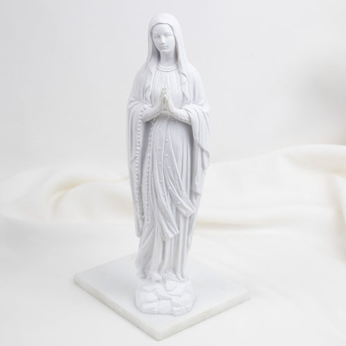 White  Our Lady of Lourdes statue of a religious figure on a white background