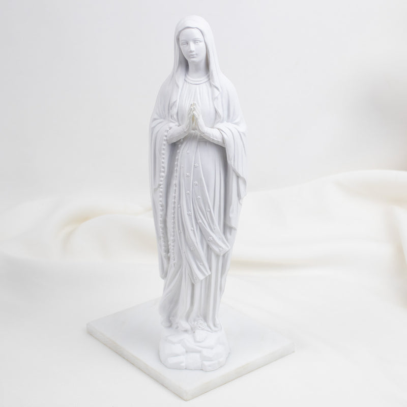 White  Our Lady of Lourdes statue of a religious figure on a white background