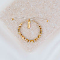 Our Lady of Medjugorje Blessing Bracelet gold and white woven gracelet