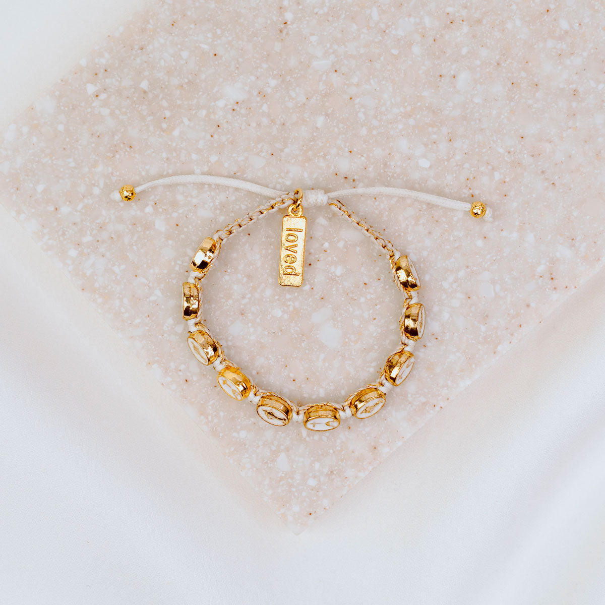 Our Lady of Medjugorje Blessing Bracelet gold and white woven gracelet