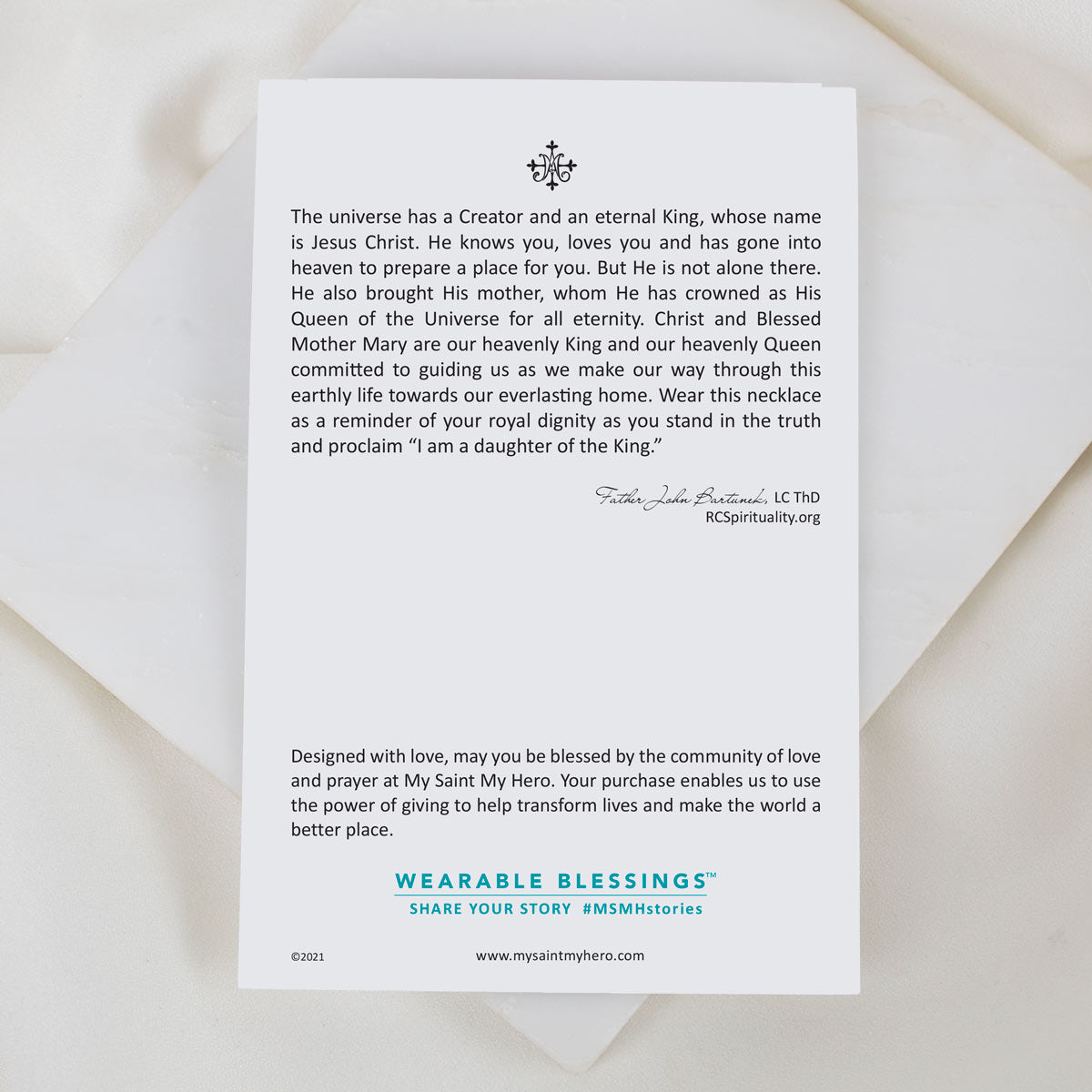 Card with text about Jesus Christ and Blessed Mary, featuring Wearable Blessings branding.