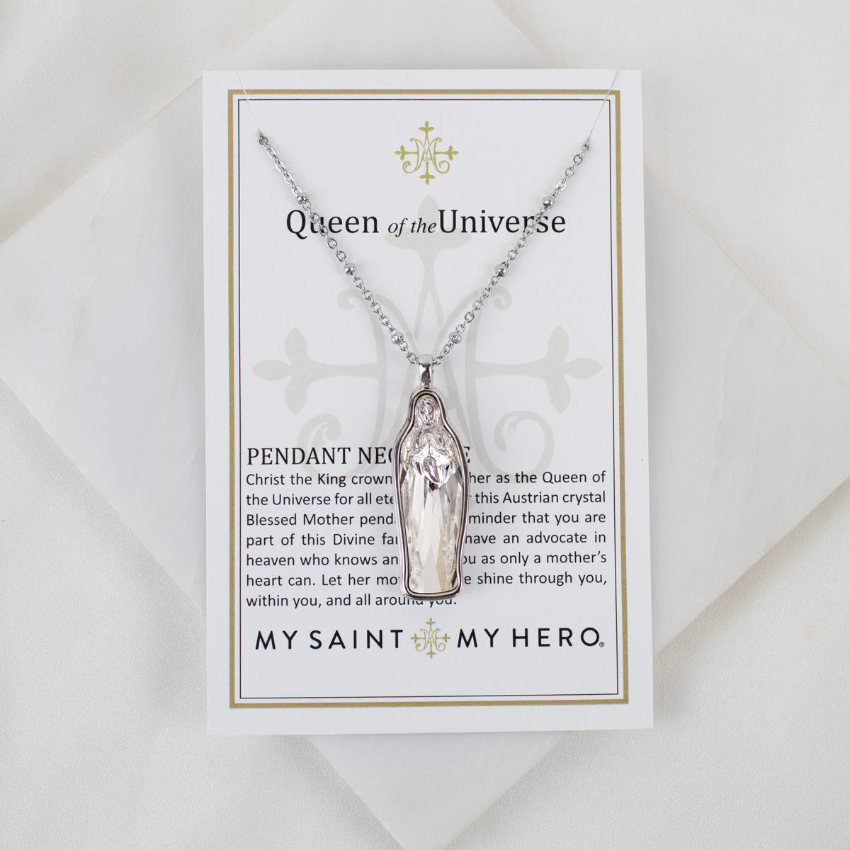 Silver pendant necklace on a card with 'My Saint My Hero' branding