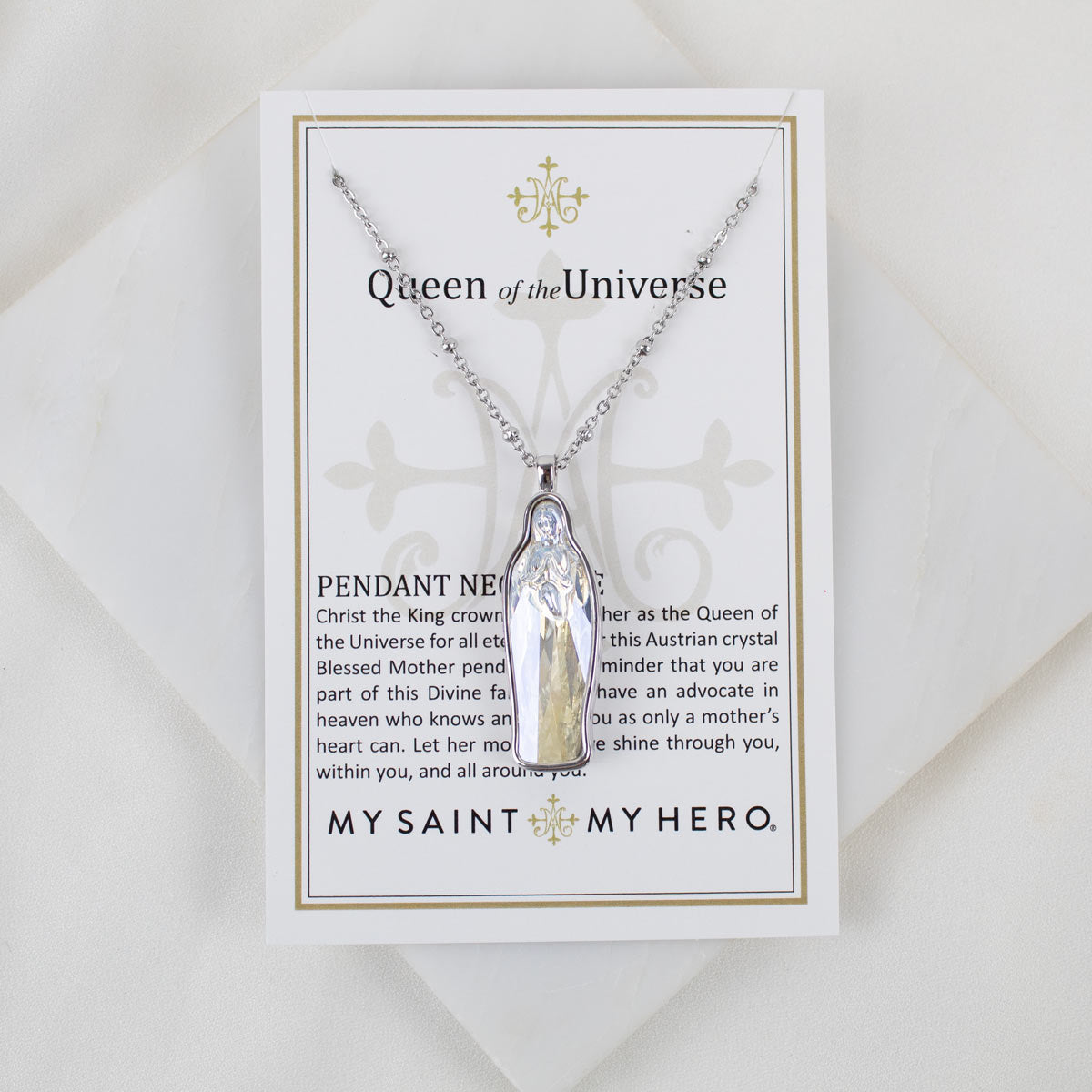 Clear wiht slight yellow Crystal Mary Pendant Necklace on a Queen of the Universe Product Card