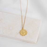 Close up of Let Love Sacred Heart 24K Vermeil Gold Sacred Heart pendant necklace