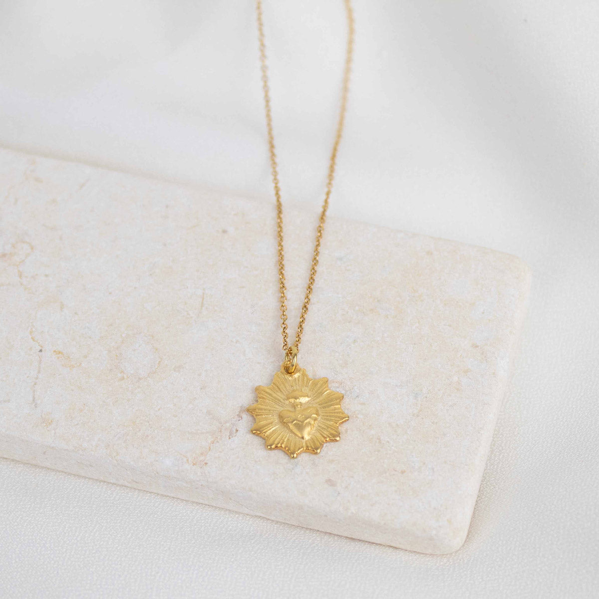 Close up of Let Love Sacred Heart 24K Vermeil Gold Sacred Heart pendant necklace