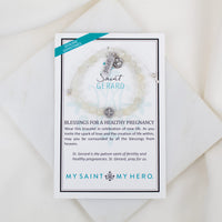Bracelet with 'Saint Gerard' charm on a branded card with text.