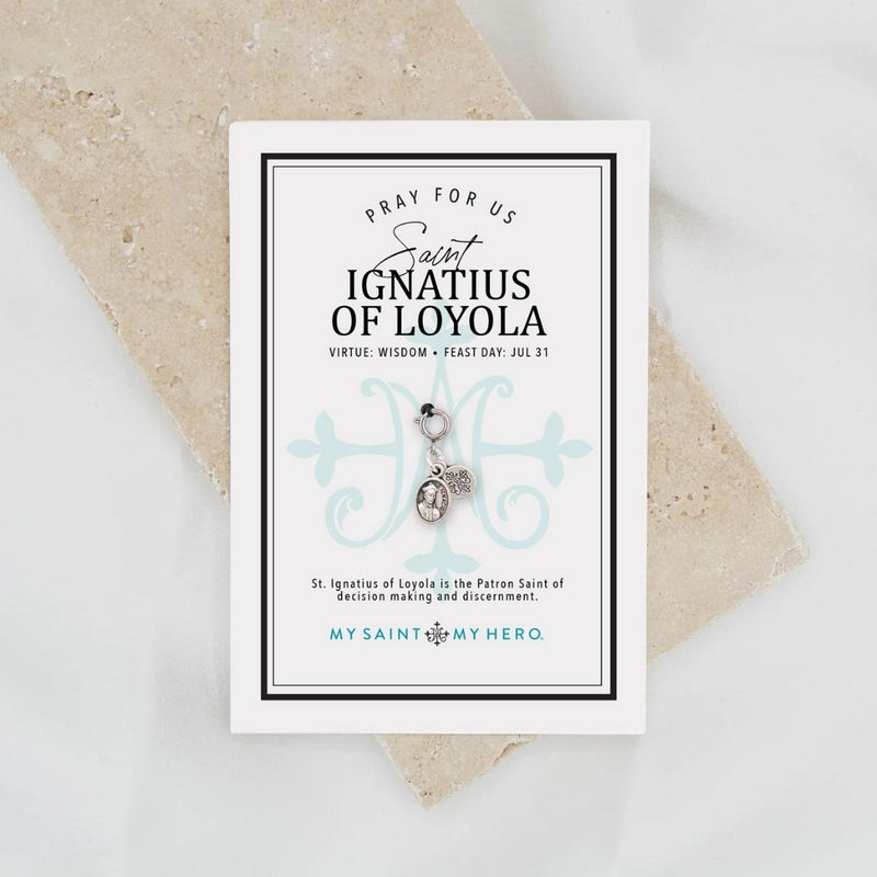 Card with 'Pray for us Saint Ignatius of Loyola' text and a pendant on a light background and petite Saint Ignatius of Loyola Medal