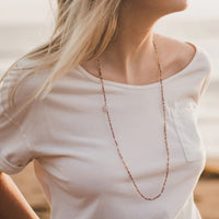 Serenity Morse Code Prayer Rope on woman on beach