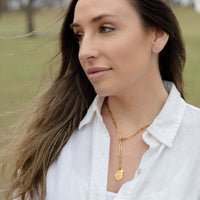Woman wearing St. Christopher Protection & Guidance Necklace