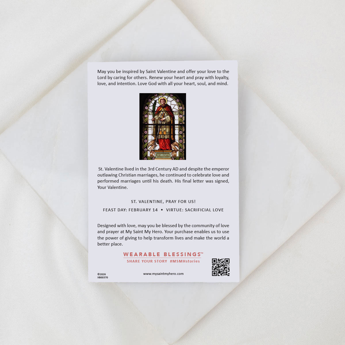 Card with St. Valentine's Day message and a QR code on a white envelope.