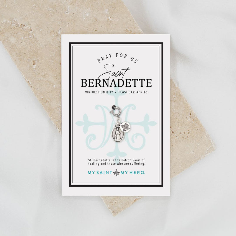 Saint Bernadette Medal in silver tone on inspirational card