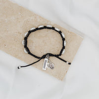 St. Joseph Medal on woven blessing bracelet