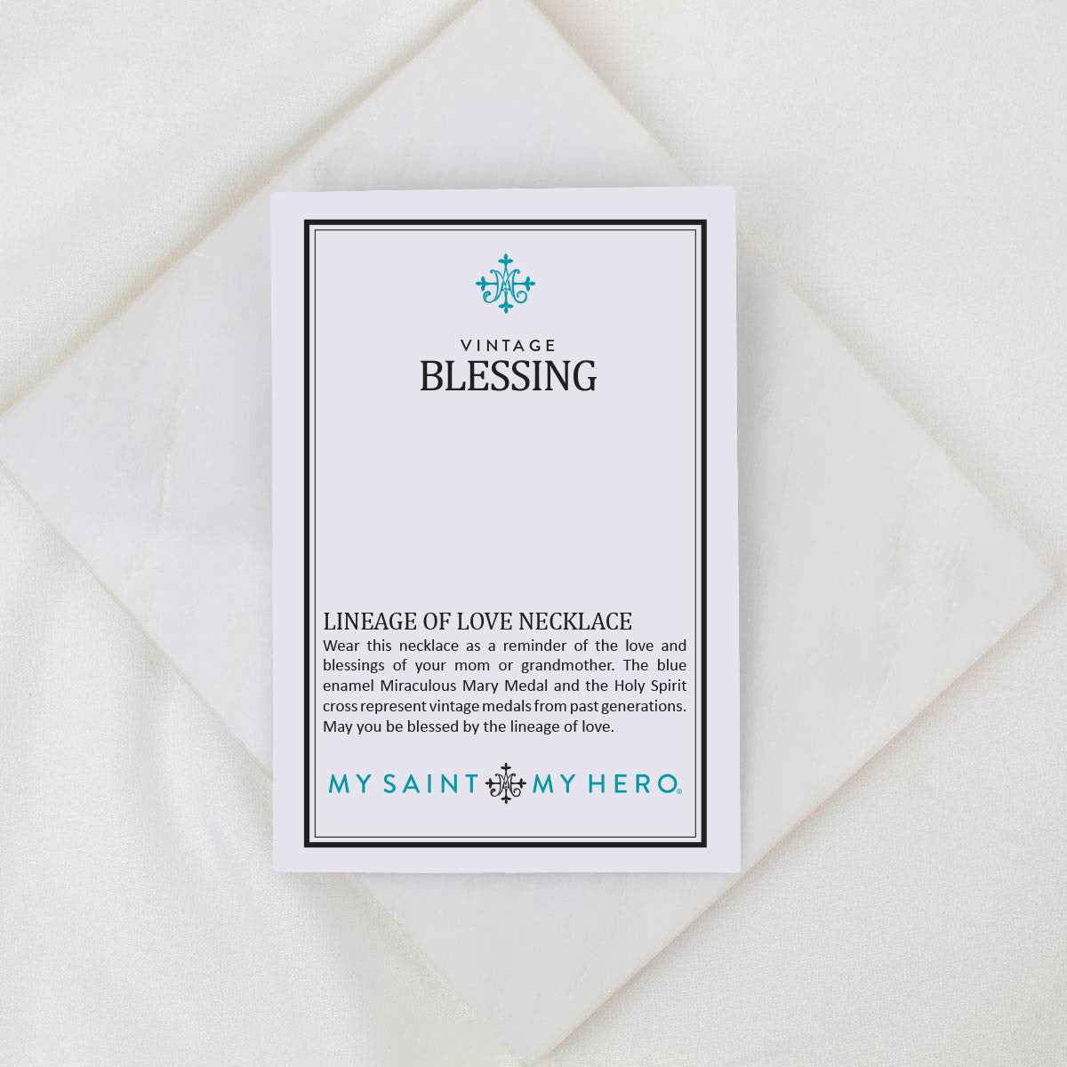 Card with 'Vintage Blessing' text and 'My Saint My Hero' branding on a white background