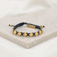 slate cording and gold tone cross medals