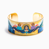 Mary Star of the Sea Cuff -Mary Star of the Sea Cuff features an image designed for My Saint My Hero by Icon Artist Vivian Imbruglia. Epoxy printed gold plated cuff. 1" height, 2.4" x 1.75" interior dimension. 