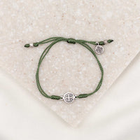 silver-tone St. Benedict medal, olive green cording, slipknot closure