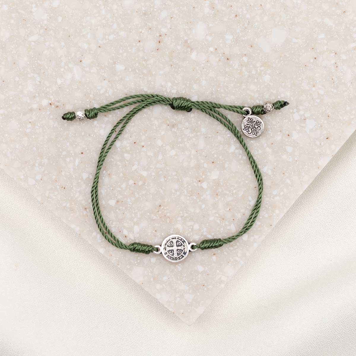 silver-tone St. Benedict medal, olive green cording, slipknot closure