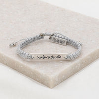 Nada te Turbe Bracelet with silver metallic cording silver tone medals 