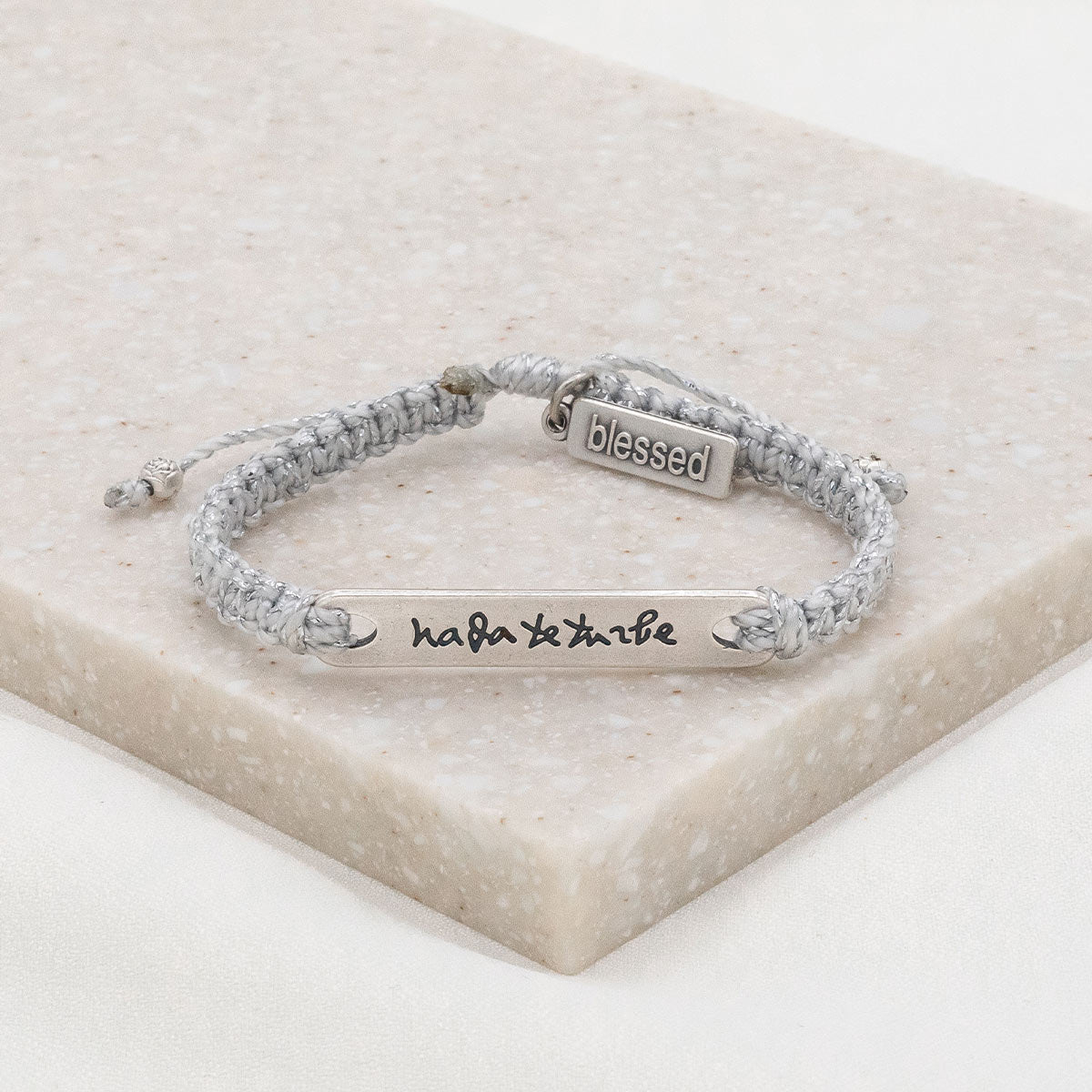 Nada te Turbe Bracelet with silver metallic cording silver tone medals 