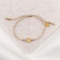 Say Yes Miraculous Mary Bracelet metallic gold cording gold medal