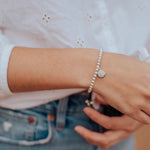 Sterling Silver Beaded Benedictine Blessing Bracelet on model's wrist