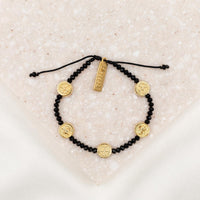 Stellar Blessings Night Sky Crystal and Benedictine Medal Blessing Bracelet with gold tone blessed charm and black crystals