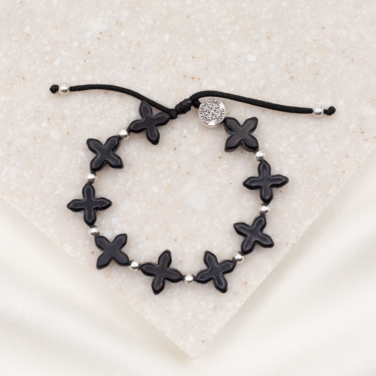 Grounded in Faith Howlite  Cross Bracelet black crosses silver medal and beads on black cording