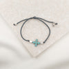 Simply Faith Corded Bracelet with dyed howlite cross two metal beads and a slipknot closure