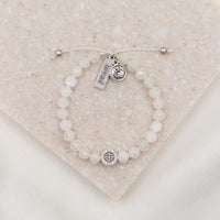 St. Amos Share the Love John Stamos Caitlin McHugh Fertility Blessing Bracelet Moonstone Gemstones St. Gerard Loved Charm Tag Medal Handwoven Cord